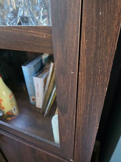 Dark wood glass cabinet