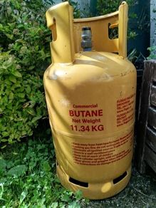 Empty butane gas cylinder