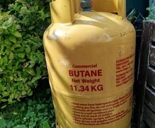 Empty butane gas cylinder