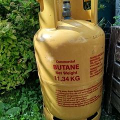 Empty butane gas cylinder