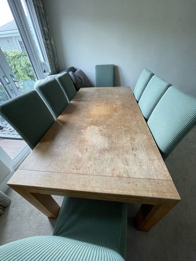dining table and 8 leather chairs