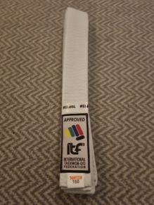 Taekwondo belt brand new, folded and still sealed