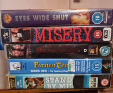 5 x VHS tapes (including Eyes Wide Shut with tape in sealed plastic, Father Ted season one part one, Stand by me, Braveheart, Misery)