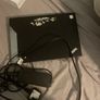 laptop and earbuds Image 3
