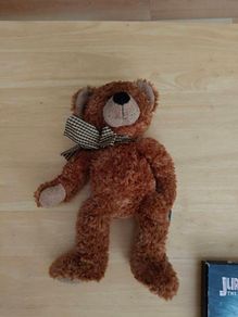 vintage brown teddy bear named Ripley produced by Russ Berrie & Co. in 2003.