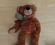 vintage brown teddy bear named Ripley produced by Russ Berrie & Co. in 2003.