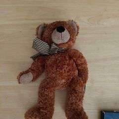 vintage brown teddy bear named Ripley produced by Russ Berrie & Co. in 2003.