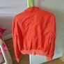 orange jacket Image 3
