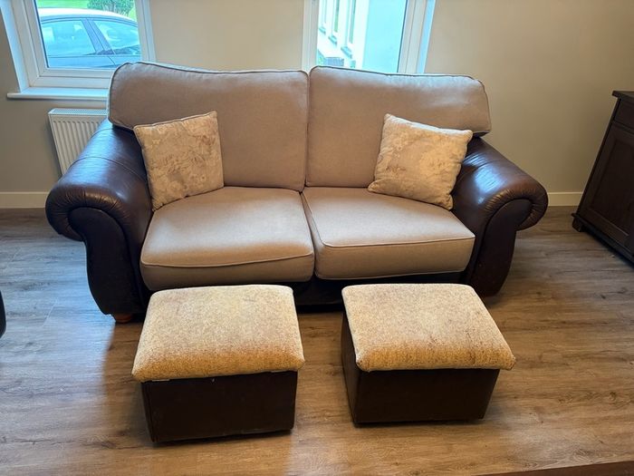 Two Sofas and footstools