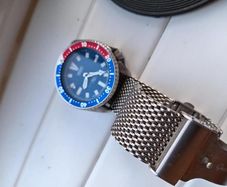Seiko automatic watch with pepsi bezel and mesh strap