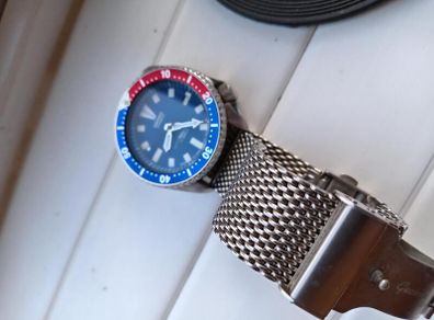 Seiko automatic watch with pepsi bezel and mesh strap