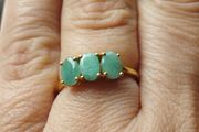 A trilogy ring for women with emeralds and 925 sterling silver in gold plated,TJC..