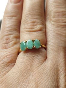 A trilogy ring for women with emeralds and 925 sterling silver in gold plated,TJC..