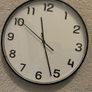 2 wooden chairs and a wall clock Image 4