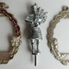 Vintage Medals and a figurine of a Scotsman