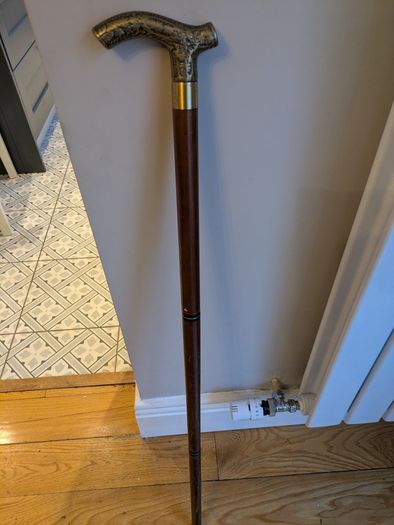 Collapsible wooden walking stick with decorative handle