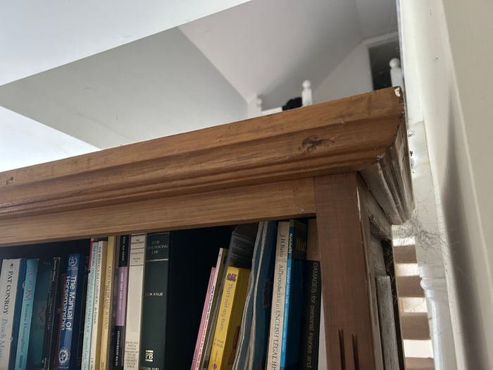 Solid wood bookshelf with bottom drawer