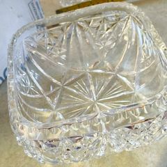 Vintage cut crystal bowl or vase featuring a decorative pinwheel or starburst pattern similar to those produced by manufacturers like Waterford or Edinburgh Crystal.  no stamp
