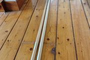 Two 2.4m Wooden moulding at right angles.  20mm x 20mm x 2.4m