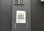 Xiaomi 14T phone with earbuds