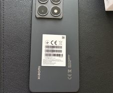 Xiaomi 14T phone with earbuds