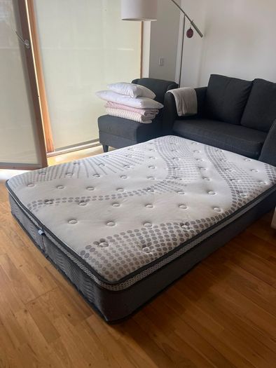 Mattress double supreme comfort with a small coffee stain