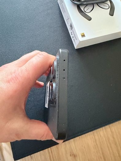Xiaomi 14T phone with earbuds