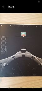Pair of vintage Tag Heuer catalogs