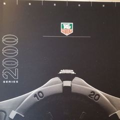 Pair of vintage Tag Heuer catalogs