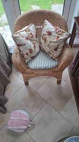 Cane chair with cushions in very good conditions.
