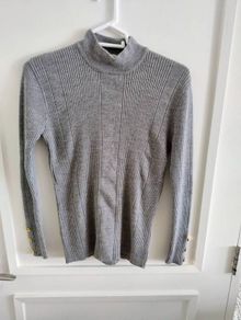 Vintage Yves Saint Laurent wool blend jumper in very good condition with a small repair on the front see photos UK size 10 but see last three photos for exact measurements made in France FREE STANDARD POSTAGE INCLUDED