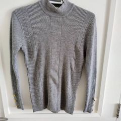 Vintage Yves Saint Laurent wool blend jumper in very good condition with a small repair on the front see photos UK size 10 but see last three photos for exact measurements made in France FREE STANDARD POSTAGE INCLUDED