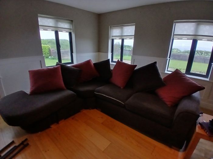 Corner sofa. Armchair and footstool