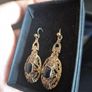 Vintage Golden Earrings with Black Core Image 2