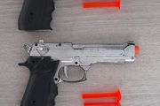 2 toy plastic guns