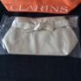 FREE tote bag or cosmetic bag with these items - Clarins Tonic Bath and Shower Concentratel and Hand and Nail.Treatment Cream 100 ml - Brand New - Gift Wrapped Image 9