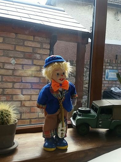 Porcelain  Wind up musical clown