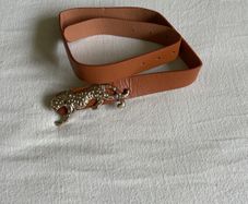 Brown belt with animal decoration