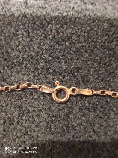 Rose gold chain with a sphere shaped pendant