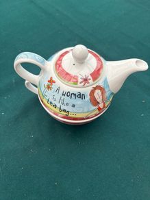 A Ceramic One Cup Teapot.