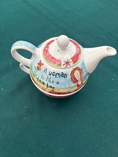 A Ceramic One Cup Teapot.