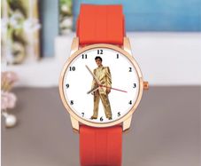 Elvis Presley themed wristwatch with orange strap