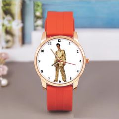 Elvis Presley themed wristwatch with orange strap