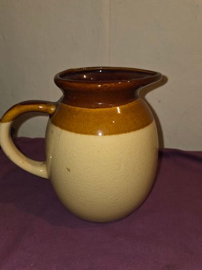 Vintage brown and tan water jug with wheat design