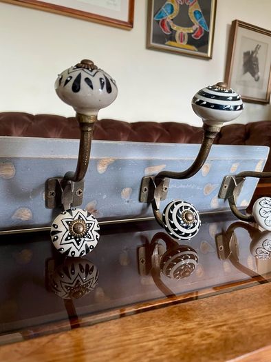 New Unused Stylish Entryway Mounted Ceramic and Brass Coat Hanger
