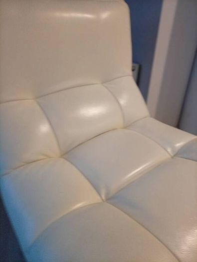 Pair of Leather Swivel Armchairs