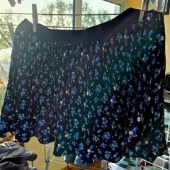 Blue ditsy floral pleated mini skirt.
