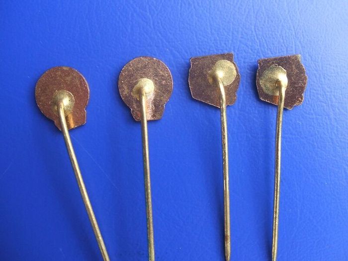 SELLIER & BELLOT (ammunition manufacturer) - four vintage promotional badges (1960s / 1970s)
