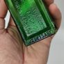 396 - Antique Aceite De Bellotas y Savia De Coco Green Glass Bottle Image 6