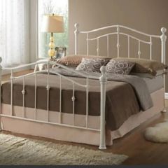 double bed with mattress and mattress topper